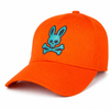 Psycho Bunny Gorras – Caja 12 Unidades – Colores Mixtos – $30.00 c/u